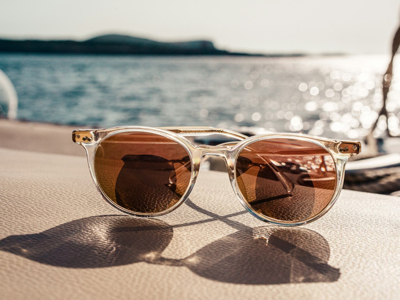 Metal sunglasses in a clean editorial still life
